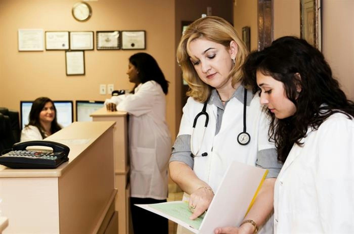 Clinic reception with paper files